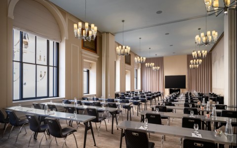 a room with tables and chairs