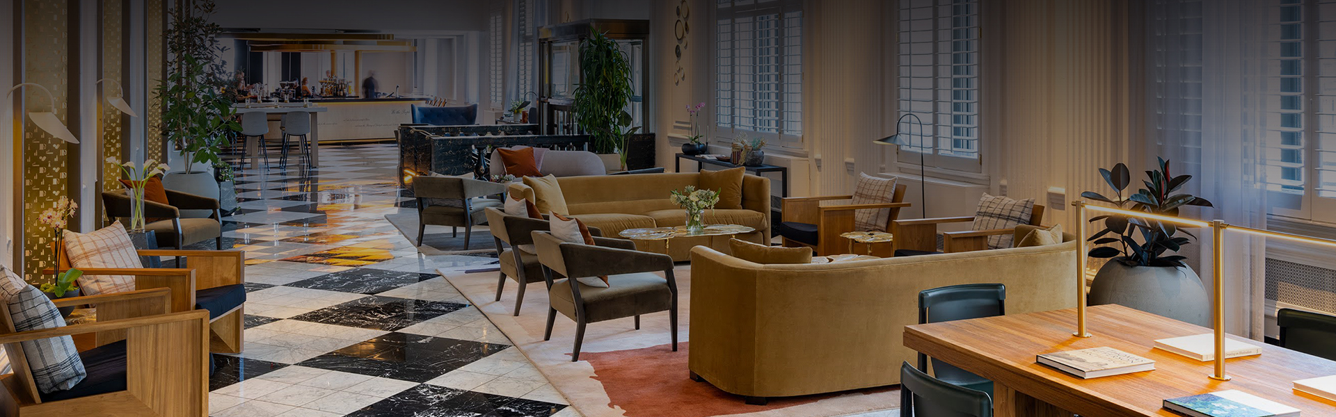 a room with a large table and chairs
