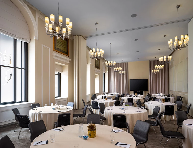 a room with tables and chairs