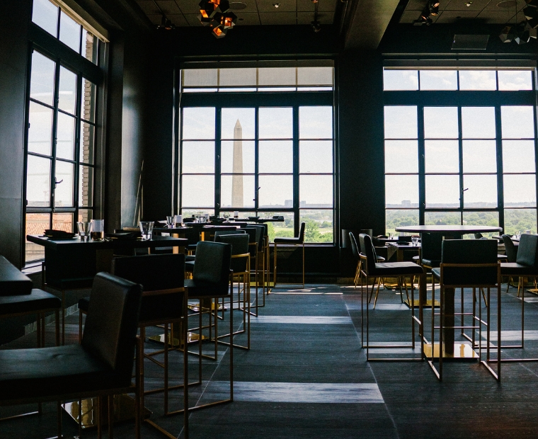 a room with tables and chairs