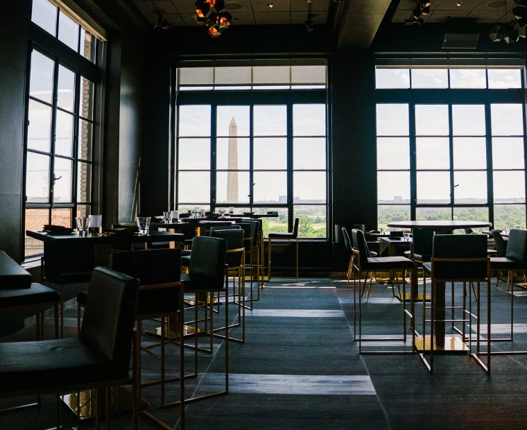 a room with tables and chairs