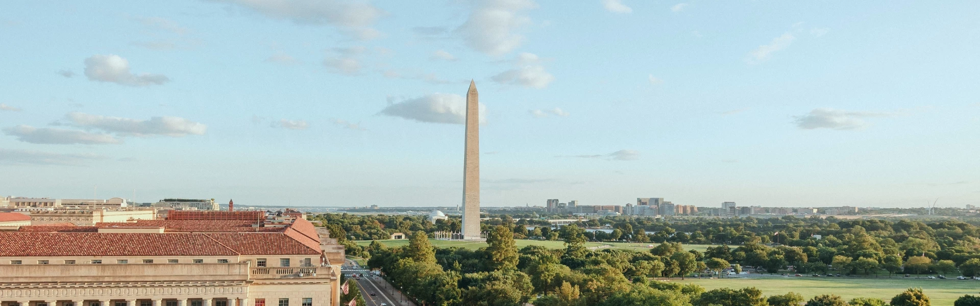 a tall monument in the middle of a city