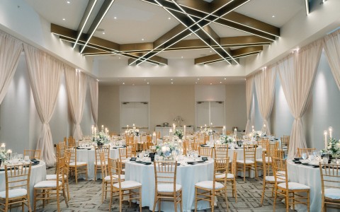 a room with tables and chairs