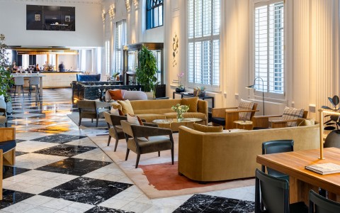 hotel lobby seating with modern tiles and bright lighting