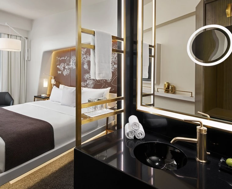 Bedroom bathroom and bed view