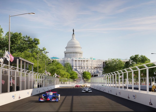a race cars on a road with a white building in the background preview