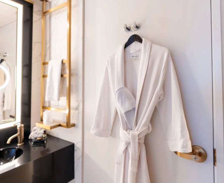 a white robe on a wall