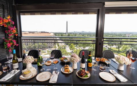 a table with food and wine glasses on it