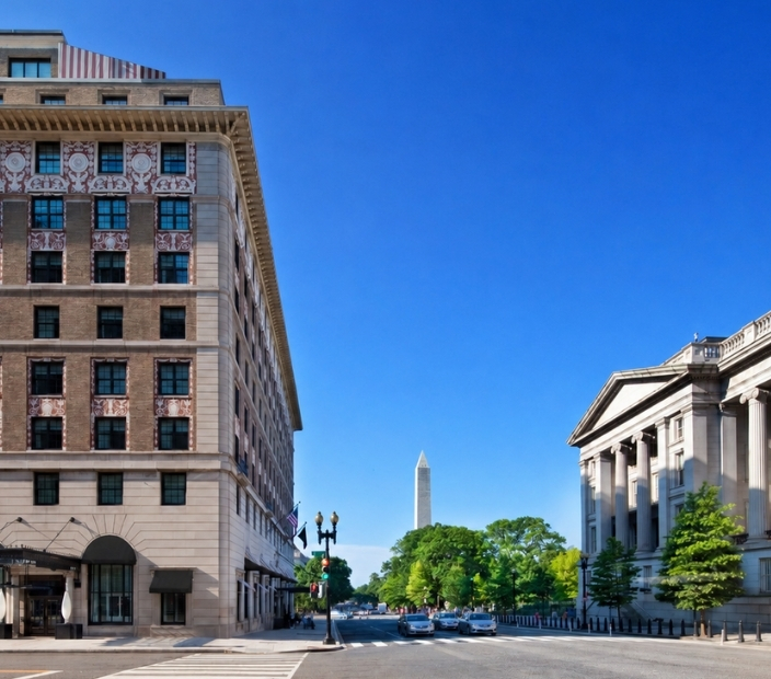 a street with buildings and a monument