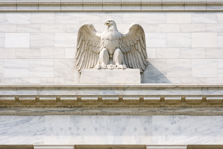 Marble eagle sculpture above entrance of Federal Reserve Building Washington DC