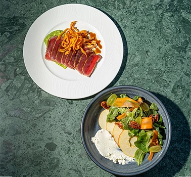 two plates of food on a table