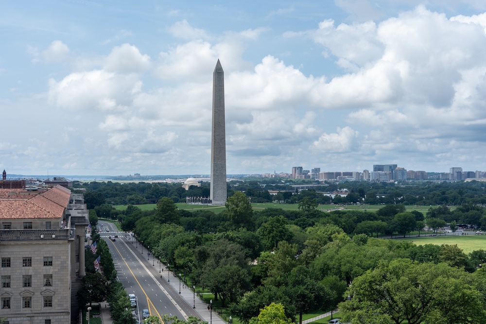 a tall monument in the middle of a city