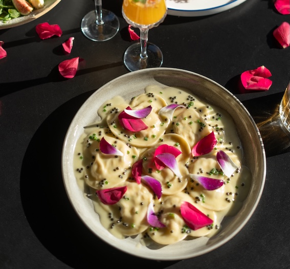 a plate of food with flowers on it