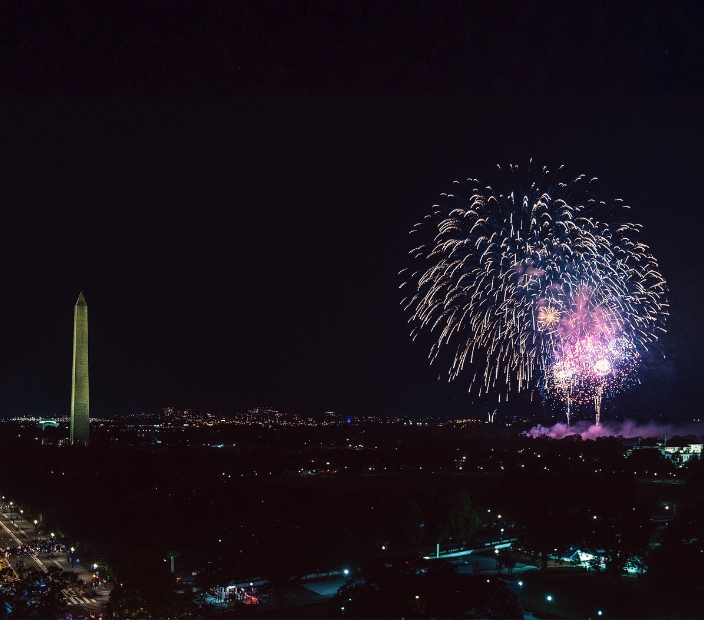 fireworks in the sky over a city