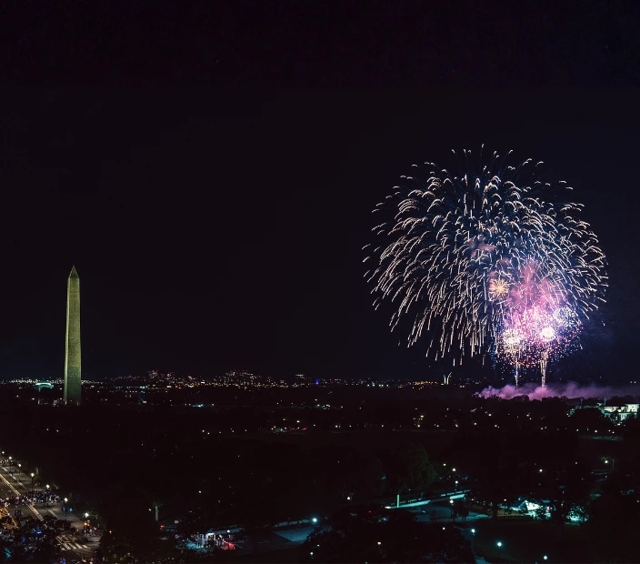 fireworks in the sky over a city