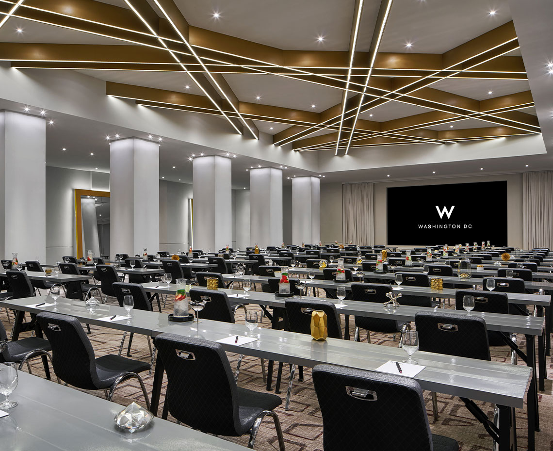 a large room with tables and chairs