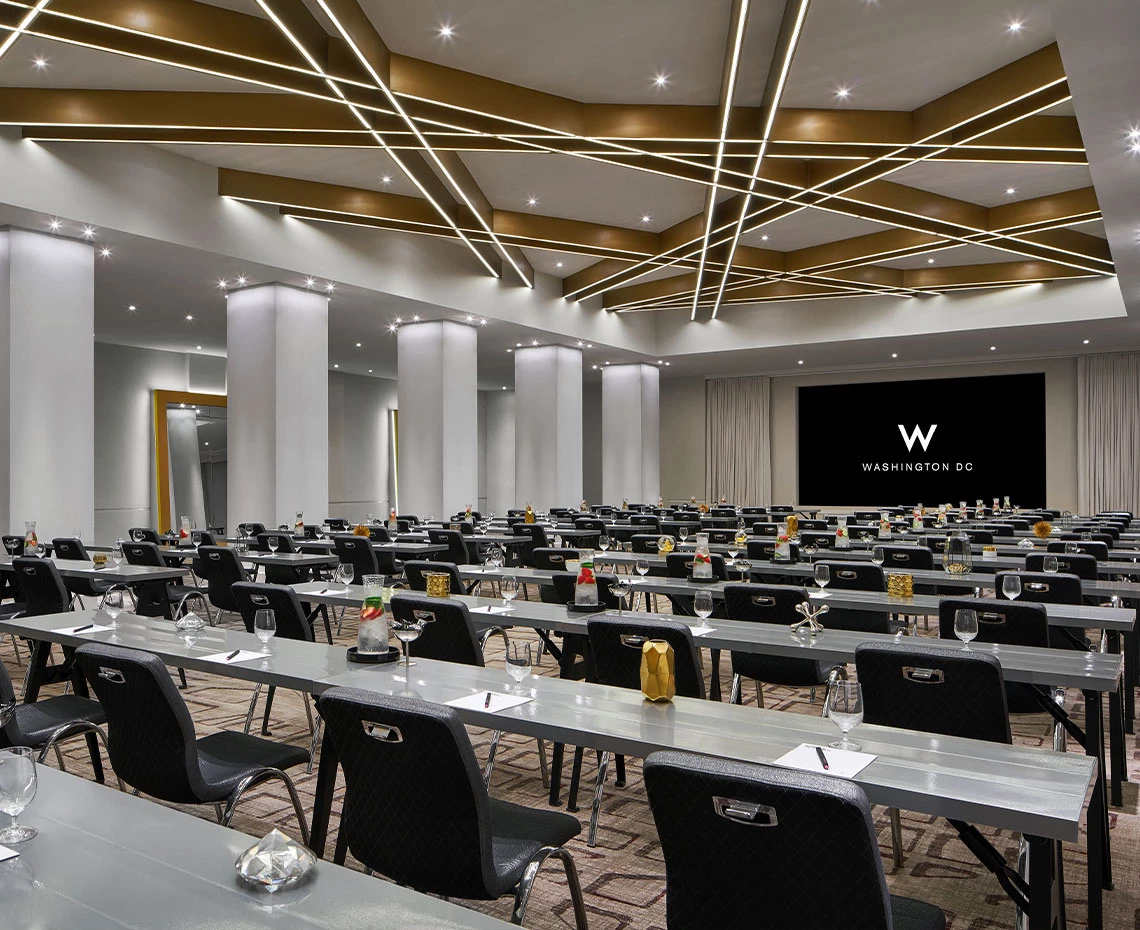 a large room with tables and chairs