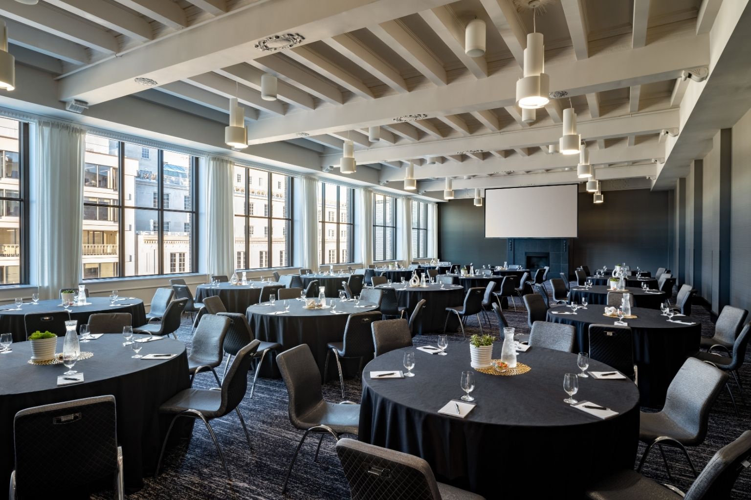 a room with tables and chairs