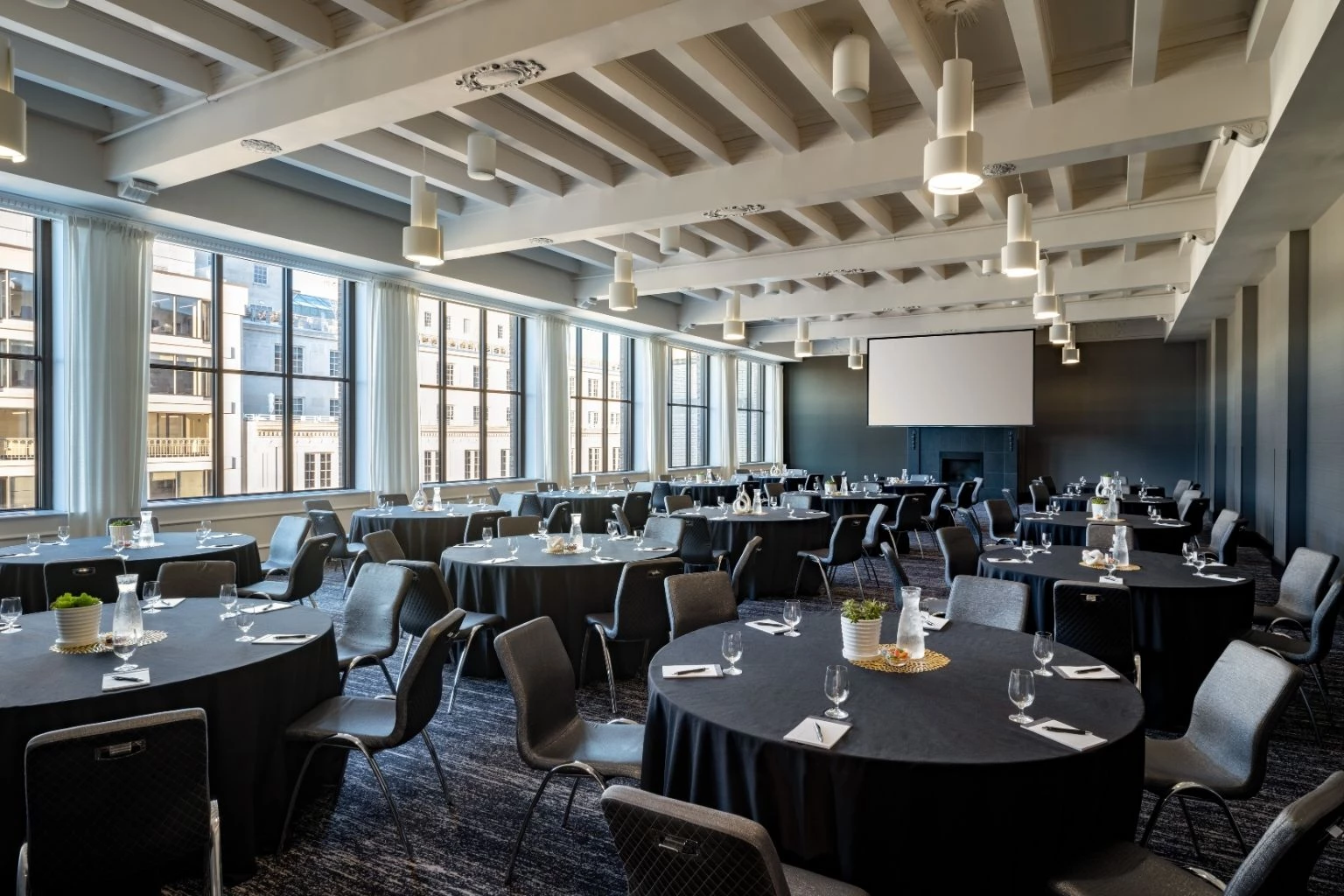 a room with tables and chairs