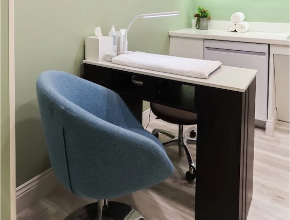 a chair next to a table