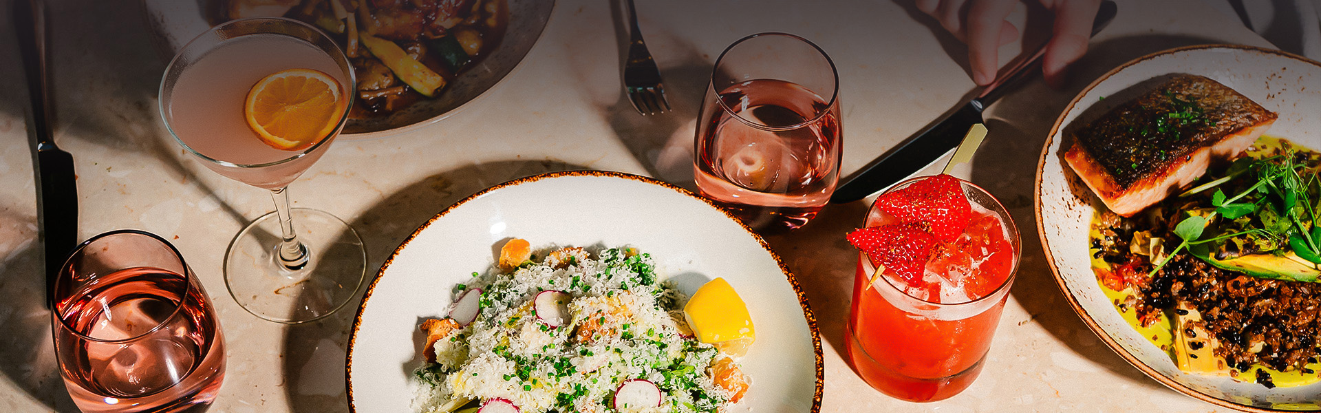 a plate of food next to a glass of water