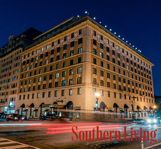a large building with lights on the side of it