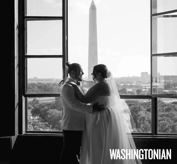 a man and woman in a white dress and a white suit