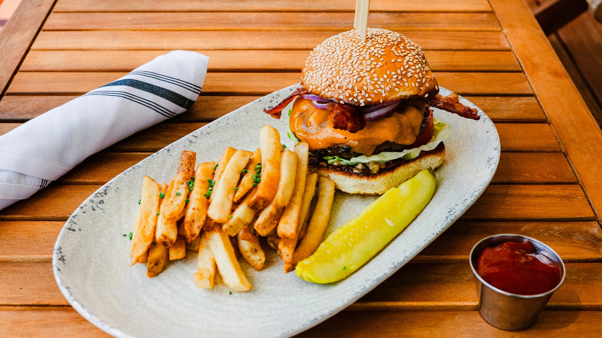 a burger and fries on a plate