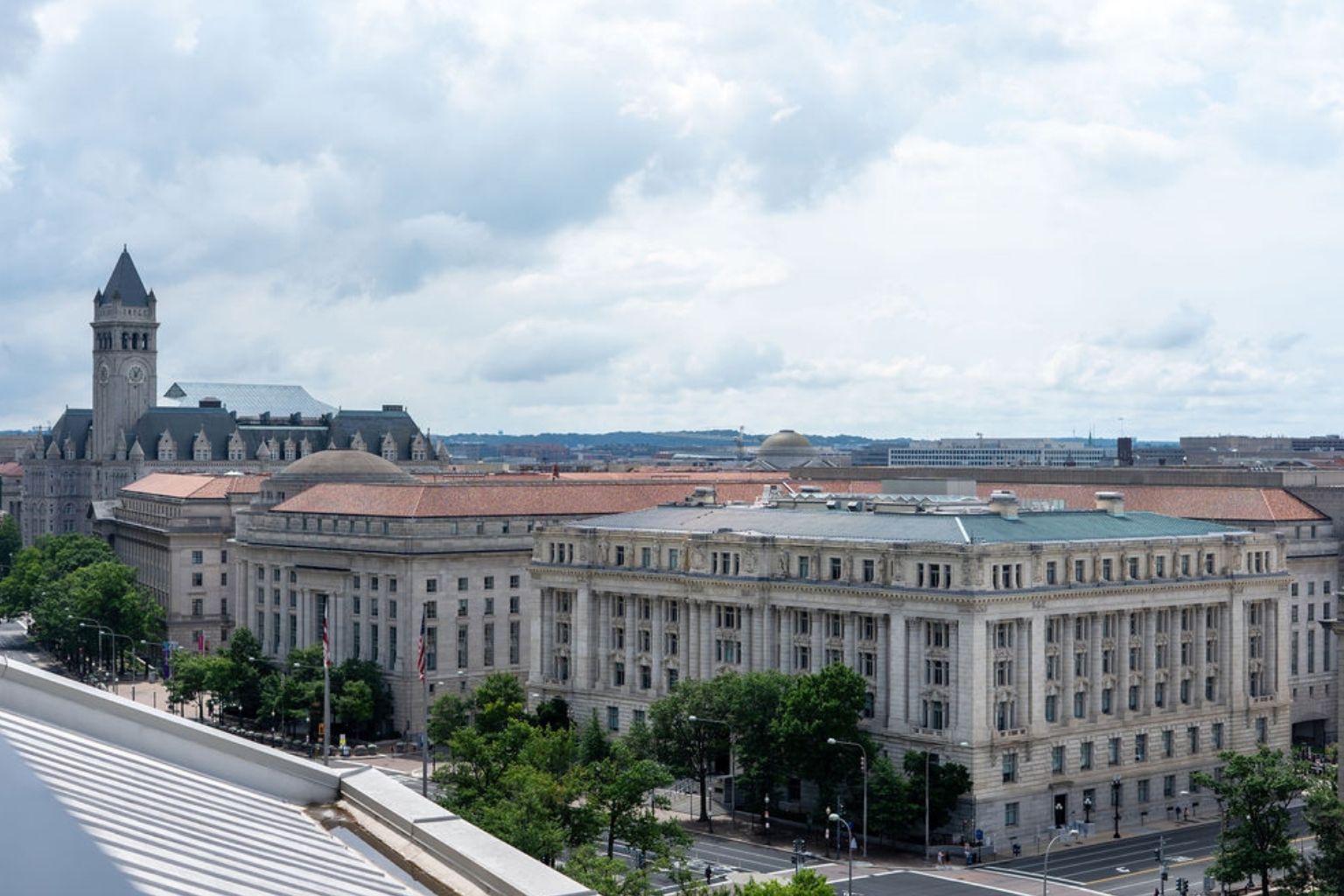 a large white building with a red roof