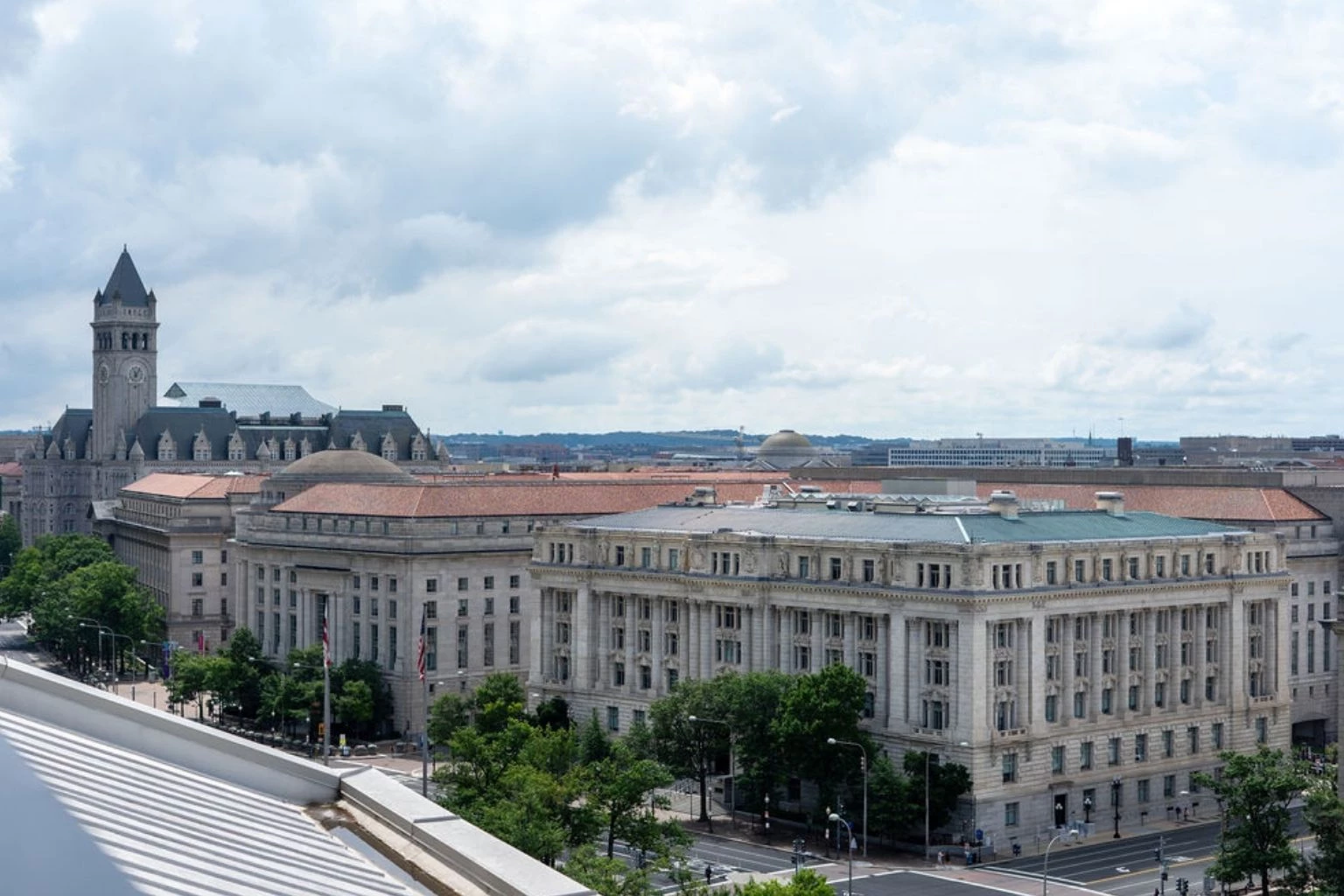 a large white building with a red roof