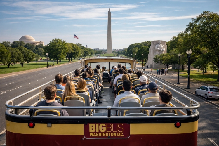 Open-top sightseeing bus touring Washington DC monuments along the National Mall.
