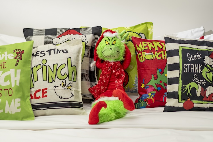 a stuffed toy on a bed