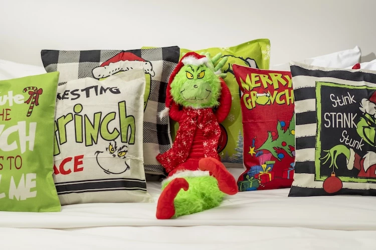 a stuffed toy on a bed