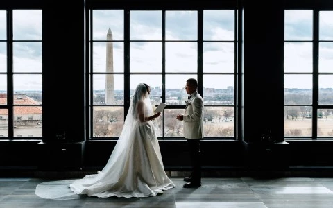 a bride and groom looking at each other