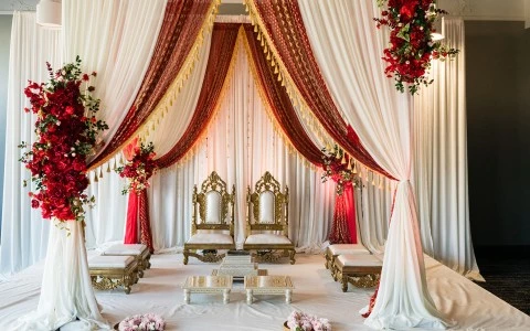 a wedding stage with chairs and tables