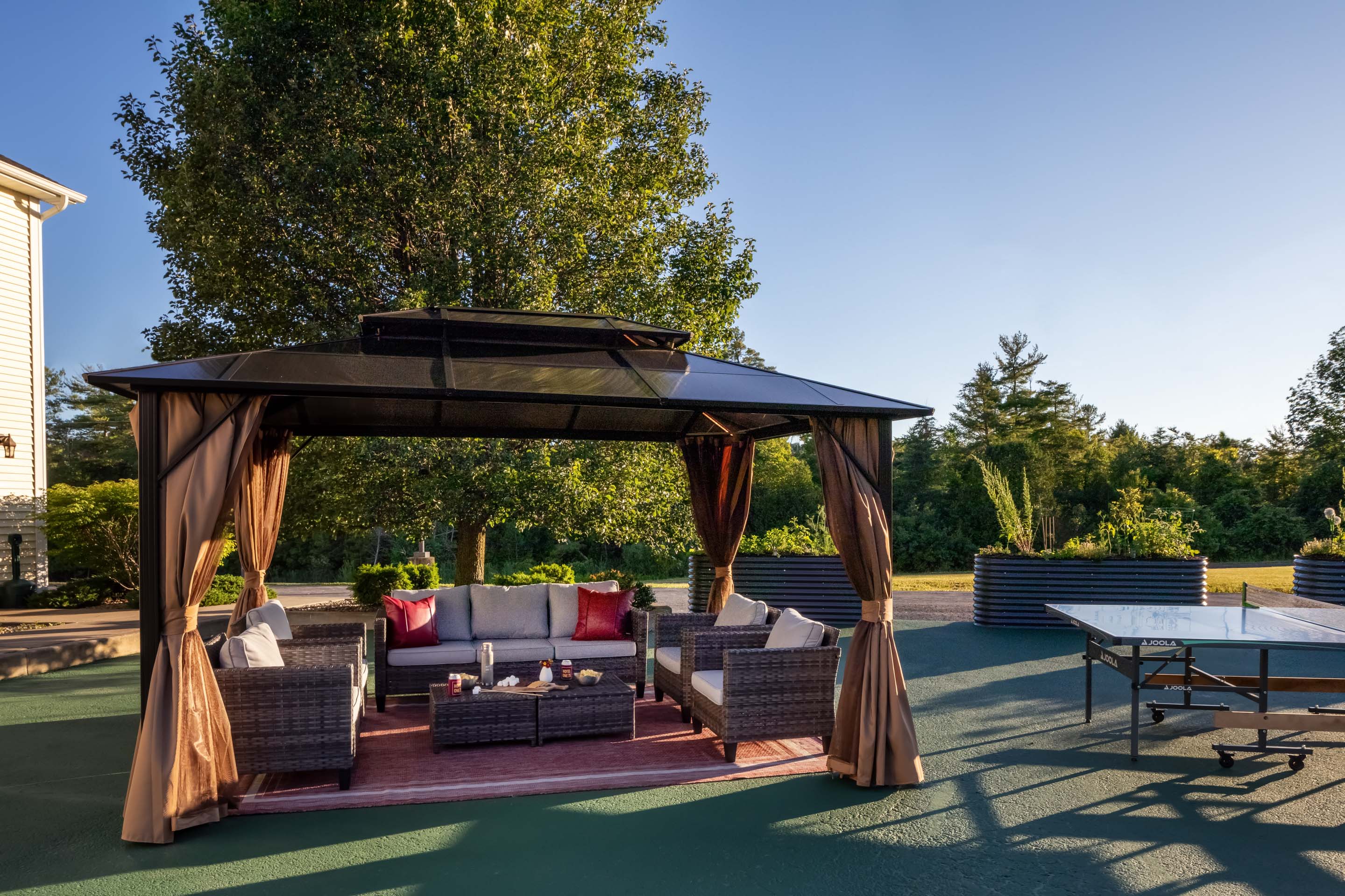 a patio with a table and chairs