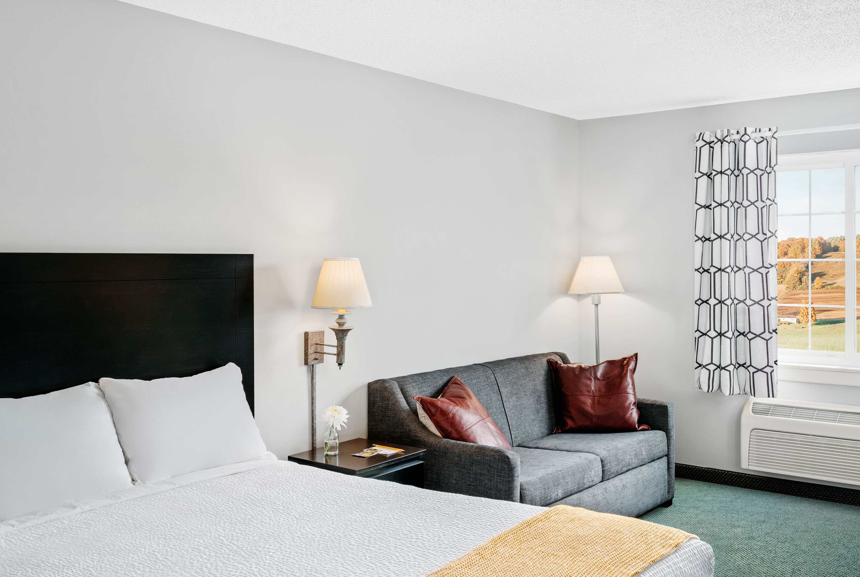 a room with a bed and a couch