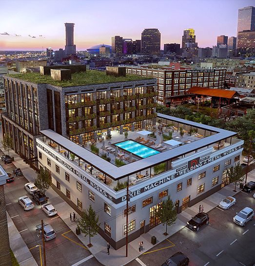 aerial view of the hotel with a rooftop pool