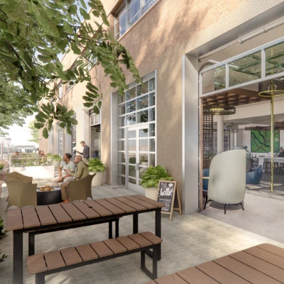 a building with a group of people sitting outside