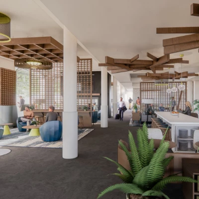 a room with people sitting at tables and chairs