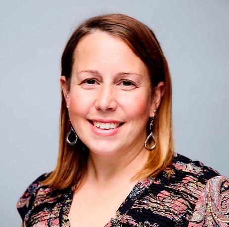 a woman smiling at the camera