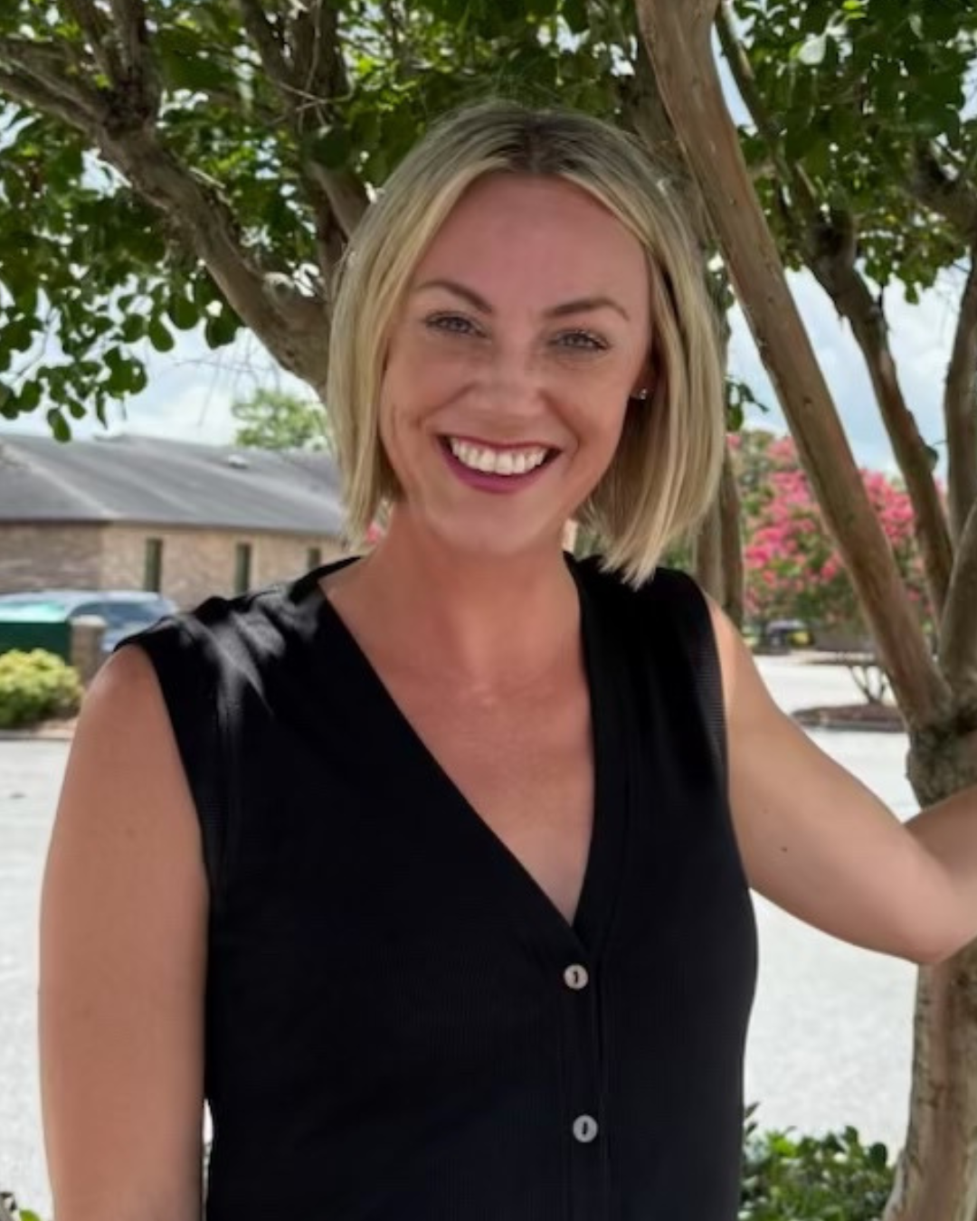 a woman smiling at camera