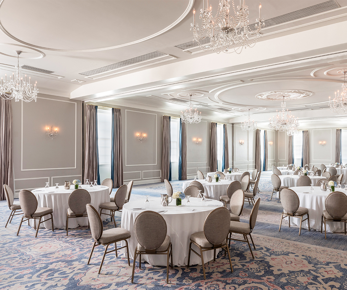 a room with tables and chairs