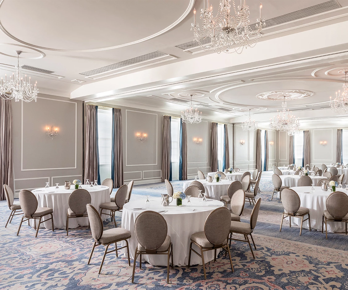 a room with tables and chairs