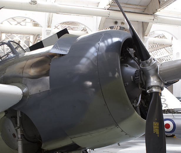 a black airplane in a swinger