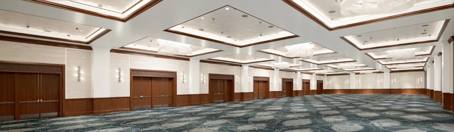 a large room with doors and carpet