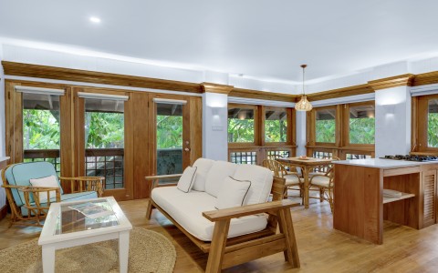 a living room with a couch and a table