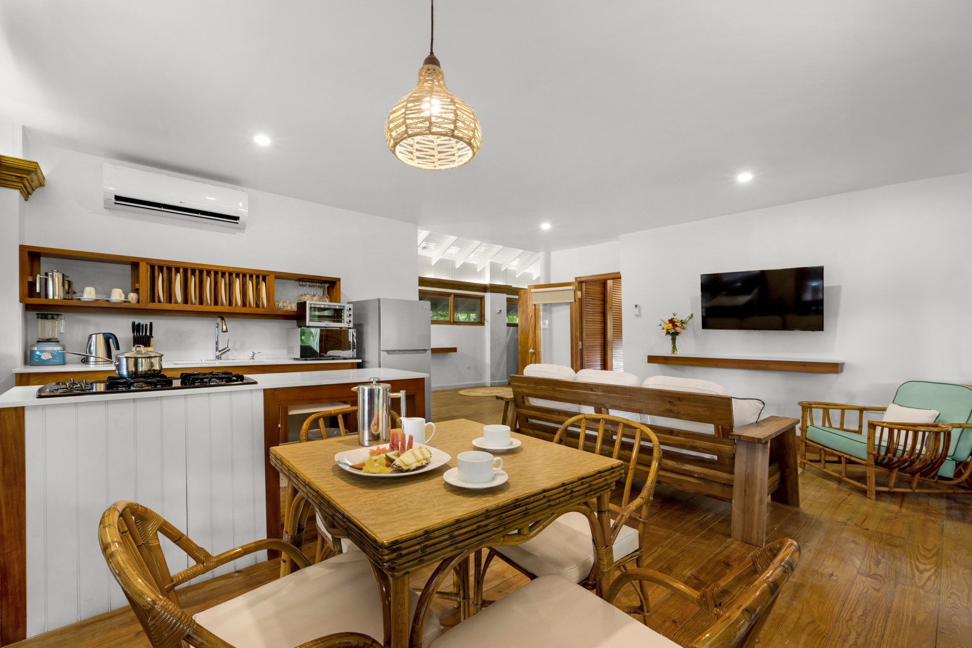 a dining table and chairs in a room
