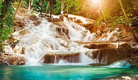 Water cascading down stones in a river.