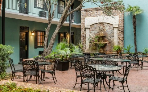 a patio with a fountain